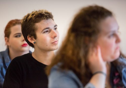 Students learning in a classroom